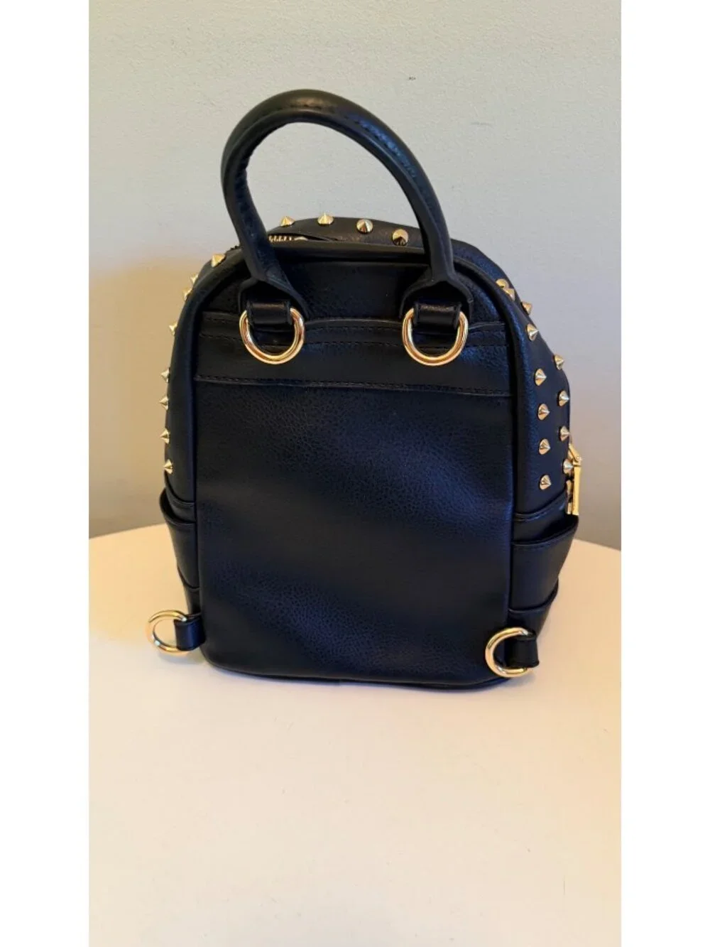 Bebe Black Mini Backpack Purse With Gold Studs & Tassel Accent